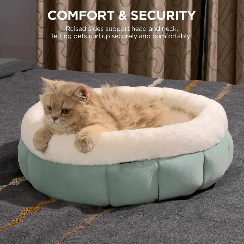Round donut dog bed in faux rabbit fur with raised sides and anti-slip bottom, sizes XS to XL, colours blue brown green pink