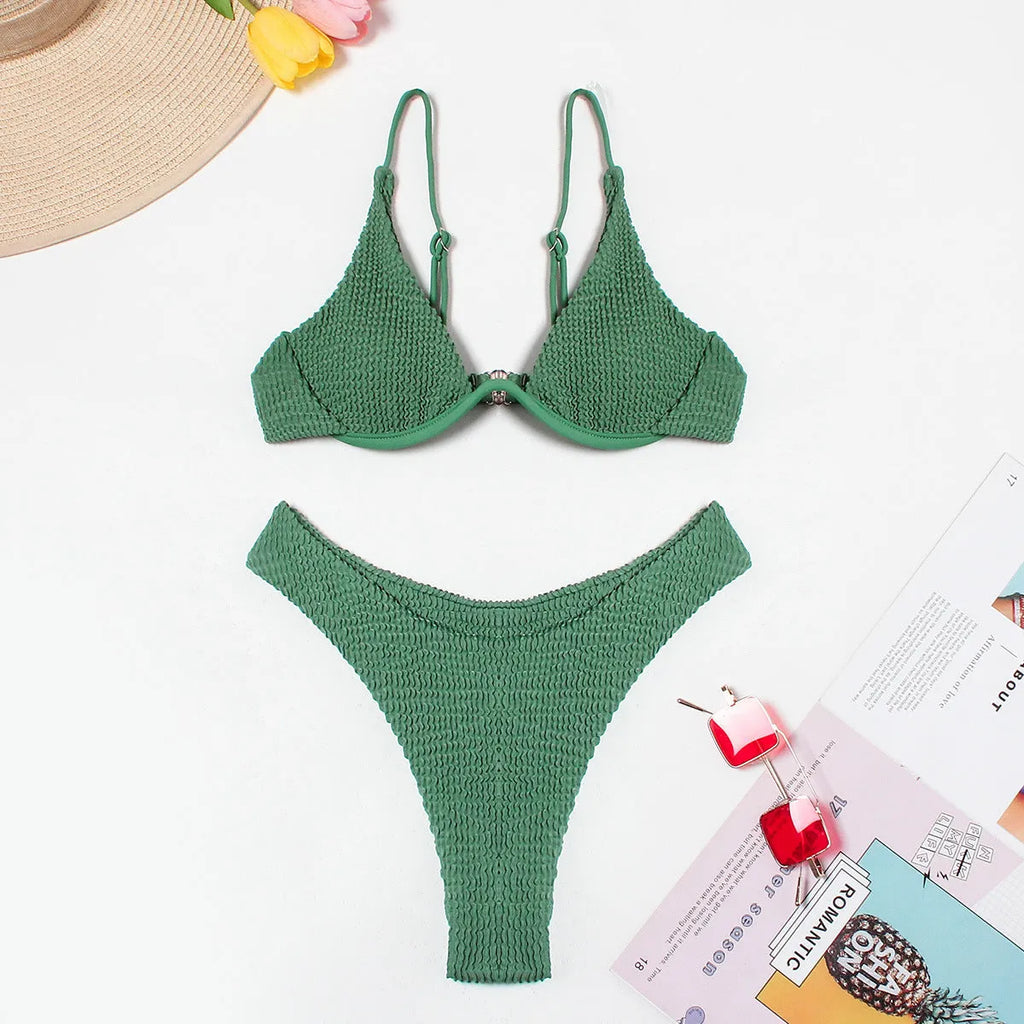 Green women's bikini suit with ruffle detail and briefs bottom