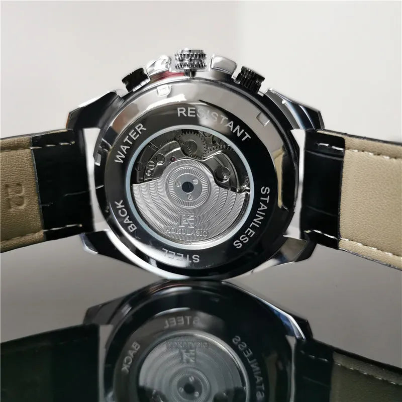 Men's automatic mechanical watch with a 12mm steel case on wrist, showing black dial and black case option.