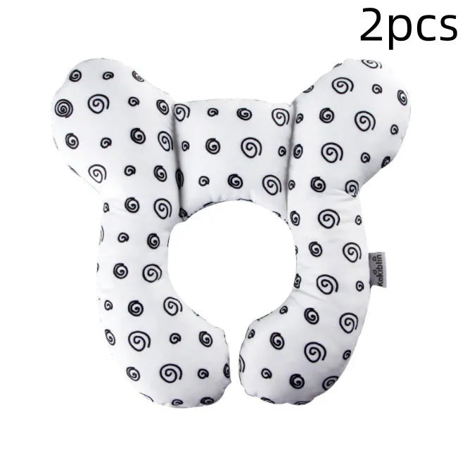 White U-shaped infant pillow with peach fabric cover and PP cotton filling for stroller neck support