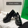 A pair of British style wide fit loafers in patent leather and matte finish options.