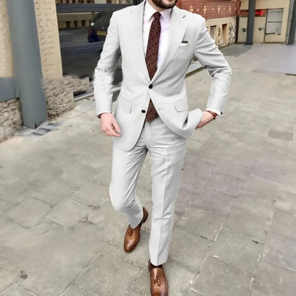 Men's slim fit two-button suit jacket and trousers in light purple acetate fabric.