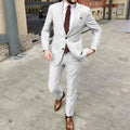 Men's slim fit two-button suit jacket and trousers in light purple acetate fabric.