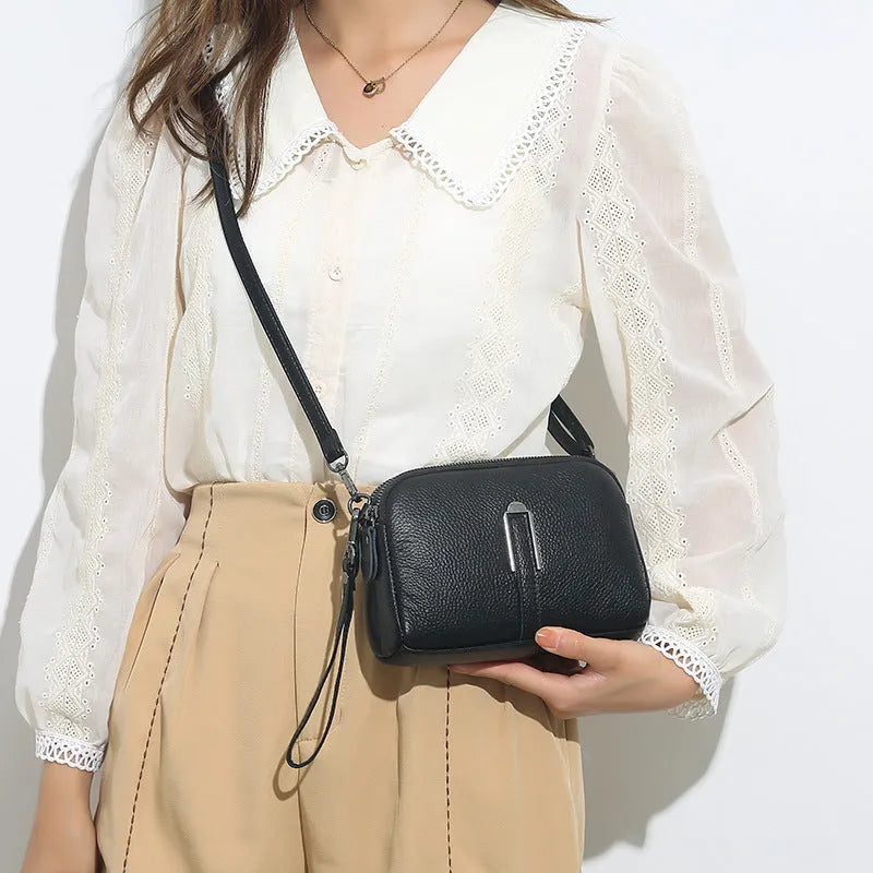 Genuine leather women's square shoulder bag in dark khaki colour, showing structured horizontal shape.