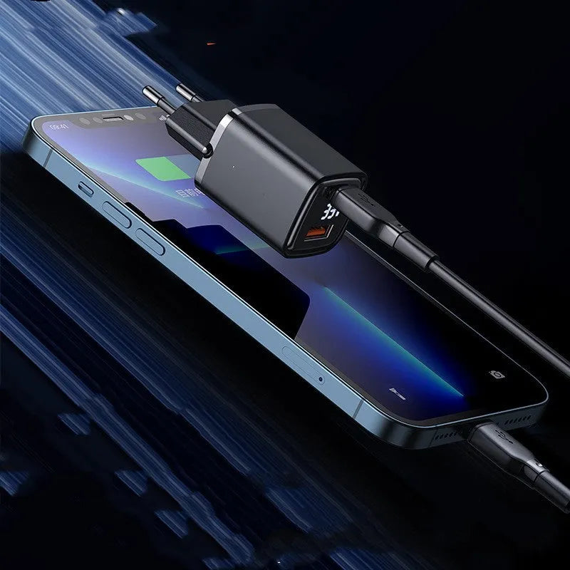 Dual-port digital display fast charging charger in black with USB-A and USB-C ports, 81x33x28mm