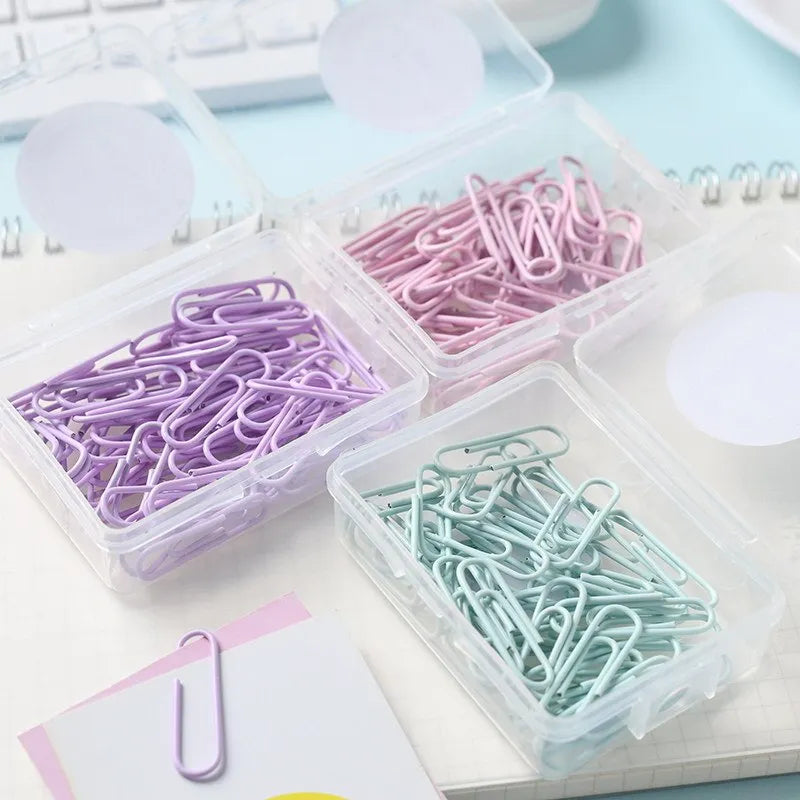 Macaron colour alloy paper clips in pink, purple, and green, 50mm large and 28mm small sizes.