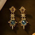 Gold retro geometric stud earrings with round shape and court style design