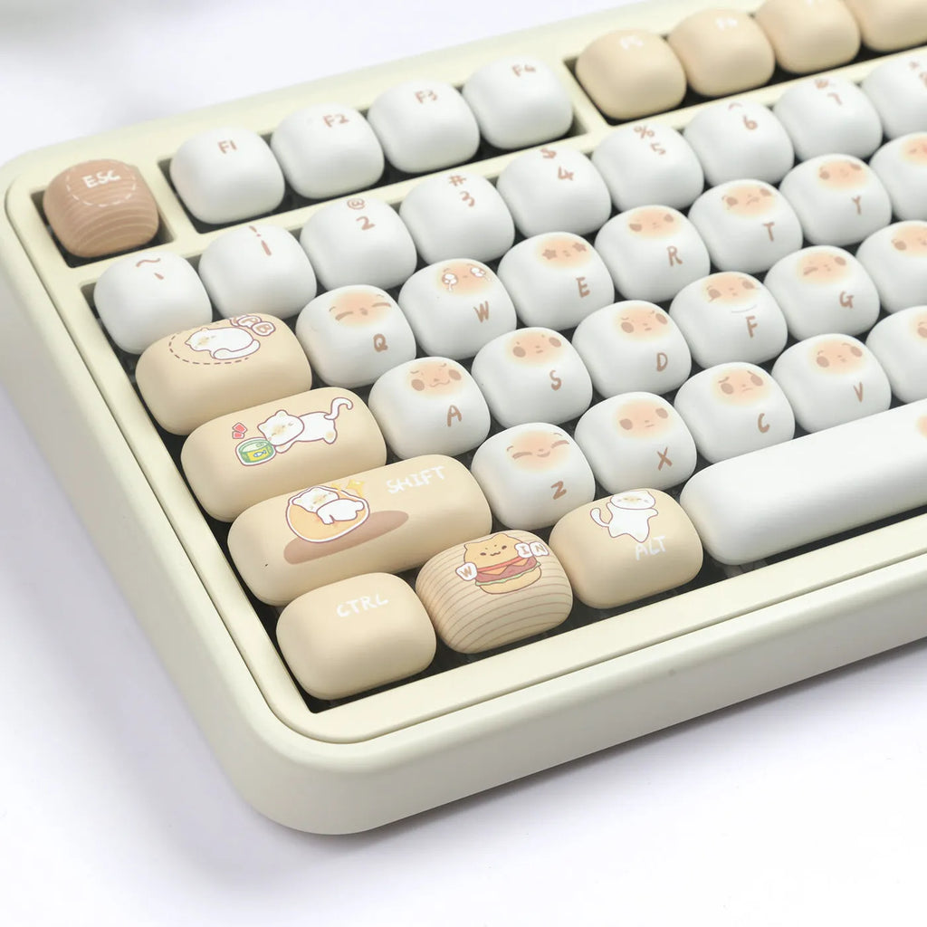 Steamed bread character march past design on a set of white PBT 7u keyboard key caps.