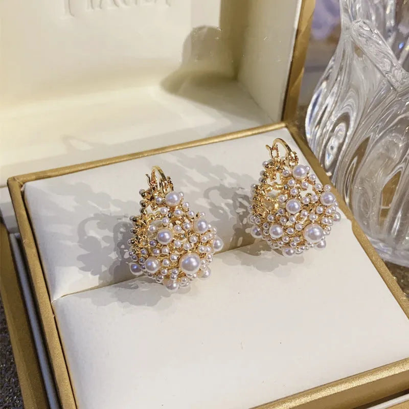 Women's gold flower basket earrings with pearl inlay on small rice-shaped beads