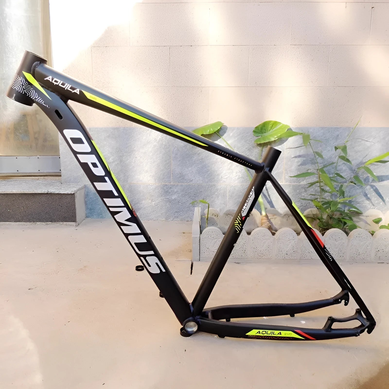 Black-green 29-inch aluminium mountain bike frame with innerline cable routing and disc brake mounts.