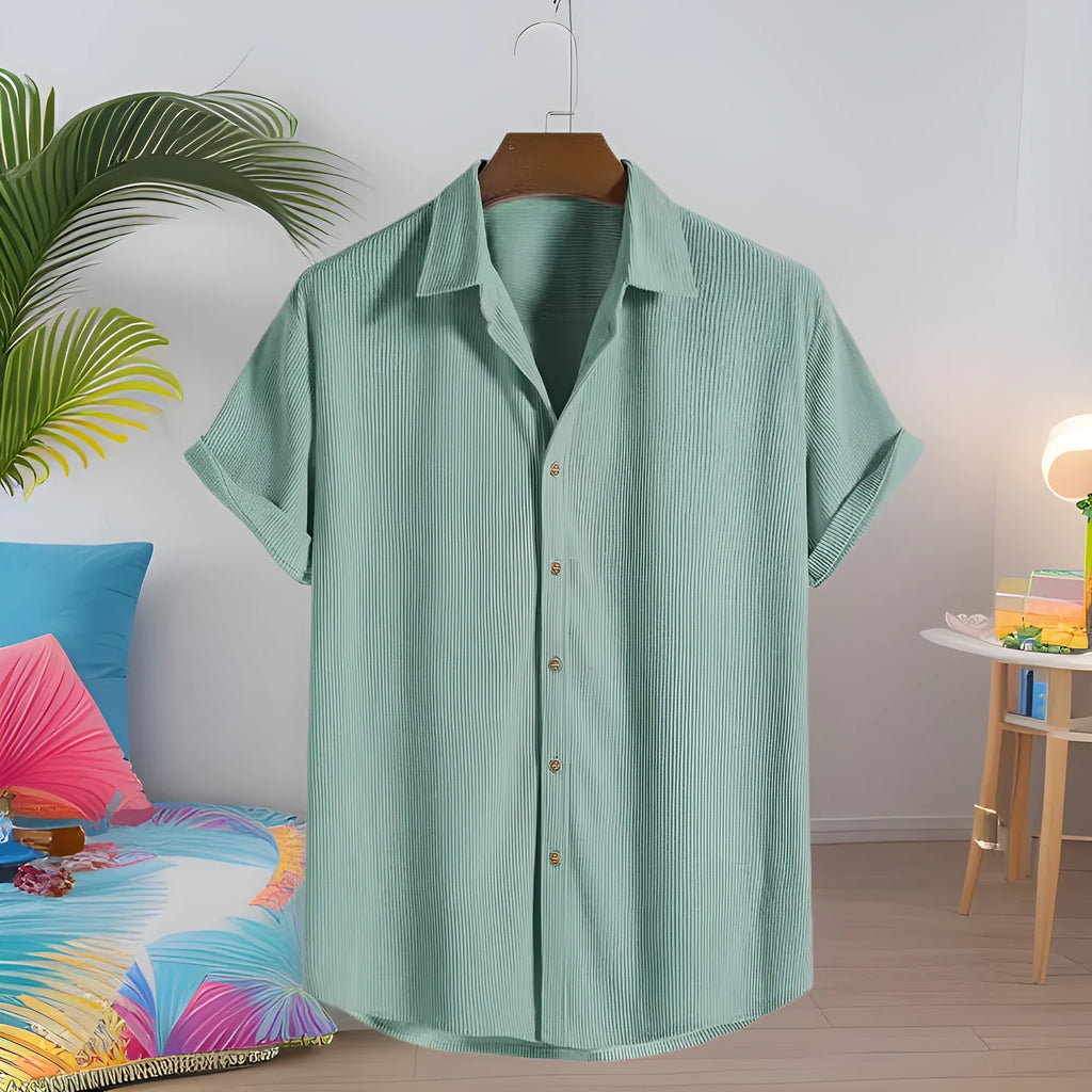 Man wearing a casual short-sleeved polyester shirt in a cardigan style, available in multiple colours.