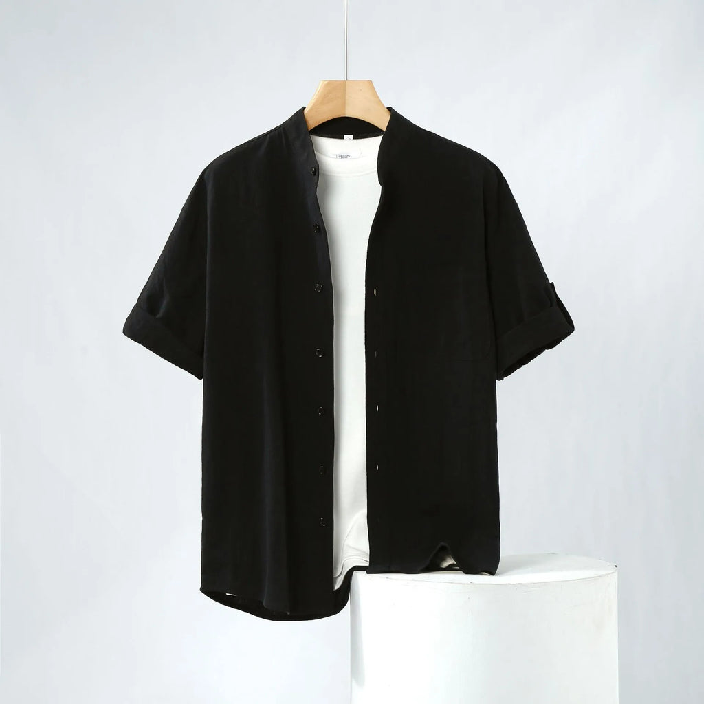 Men's loose short sleeve linen shirt in cotton blend with stand collar.