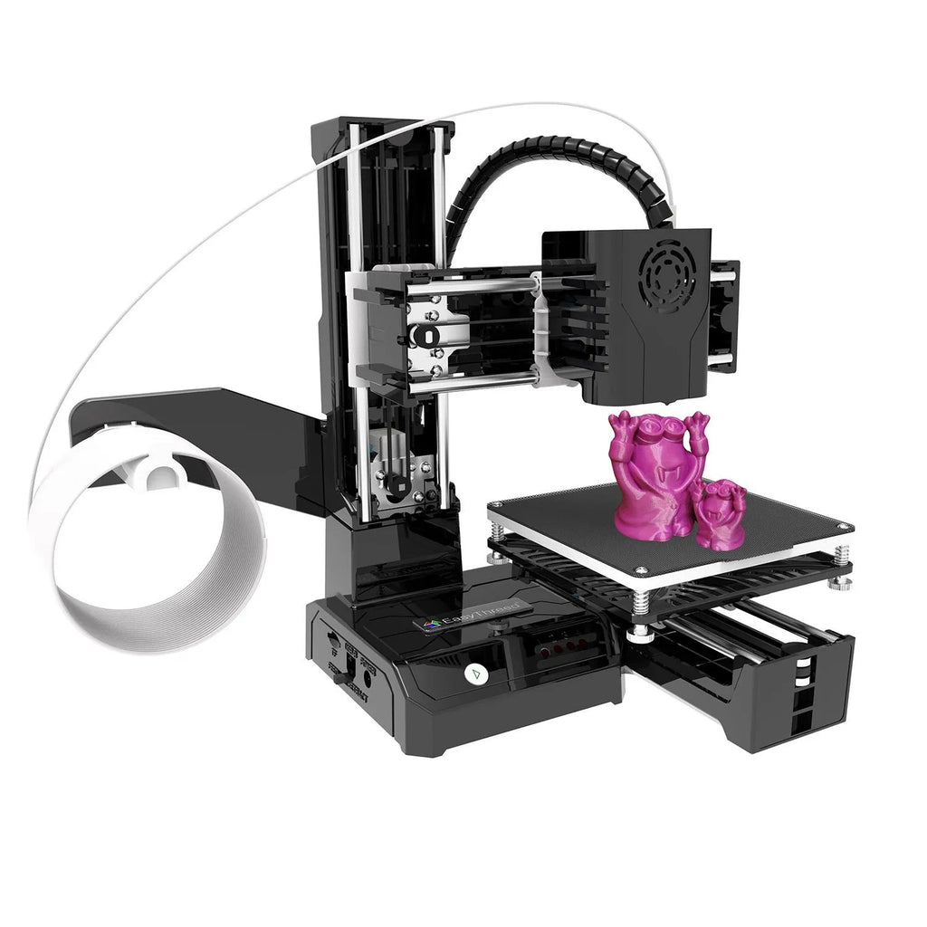 K9 mini 3D printer on a desk with small printed PLA model next to it.