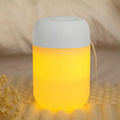 Small white cylindrical USB-powered humidifier for silent bedroom and desk use.