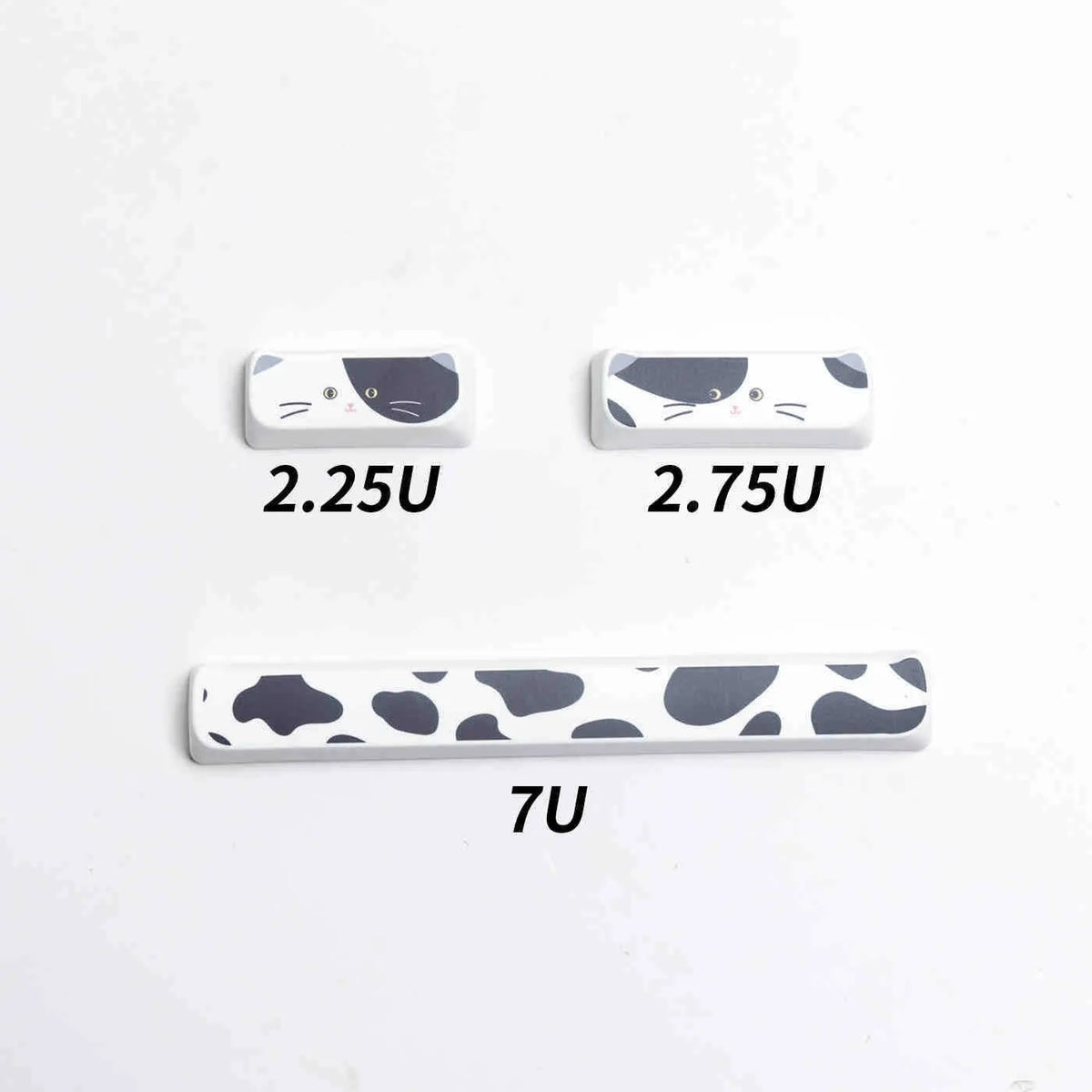 Black and white kitten sublimation PBT key cap set in boxed packaging, full layout excluding 7u and March space keys
