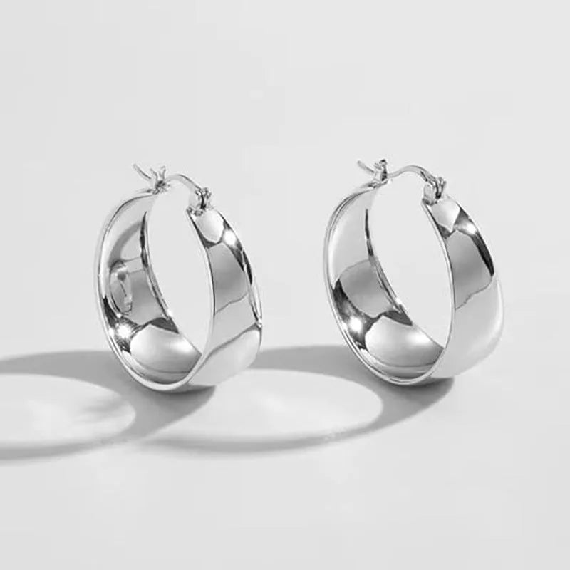 Stainless steel earrings with curved ear wire in gold or steel colour, 25mm and 30mm sizes