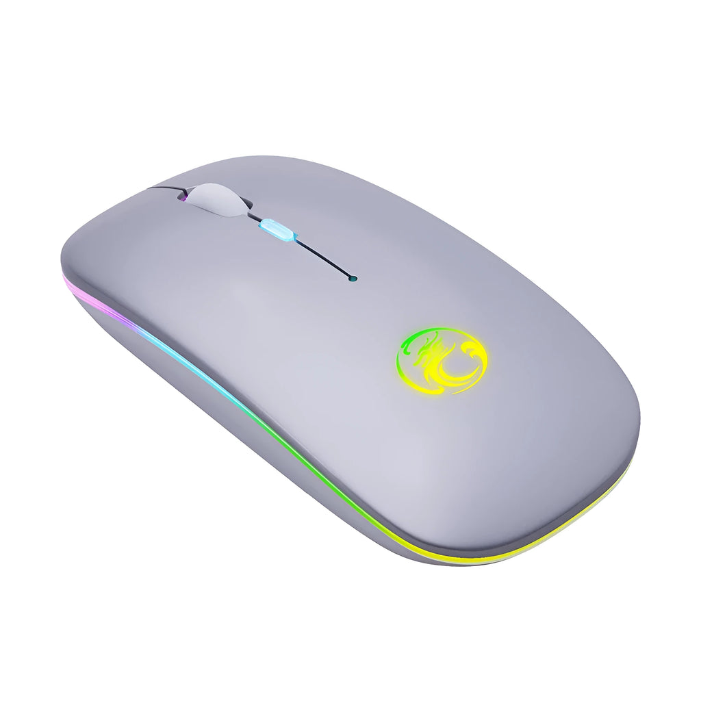 Black and white dual-mode wireless silent mouse with luminous charging scroll wheel on a desk.