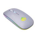 Black and white dual-mode wireless silent mouse with luminous charging scroll wheel on a desk.