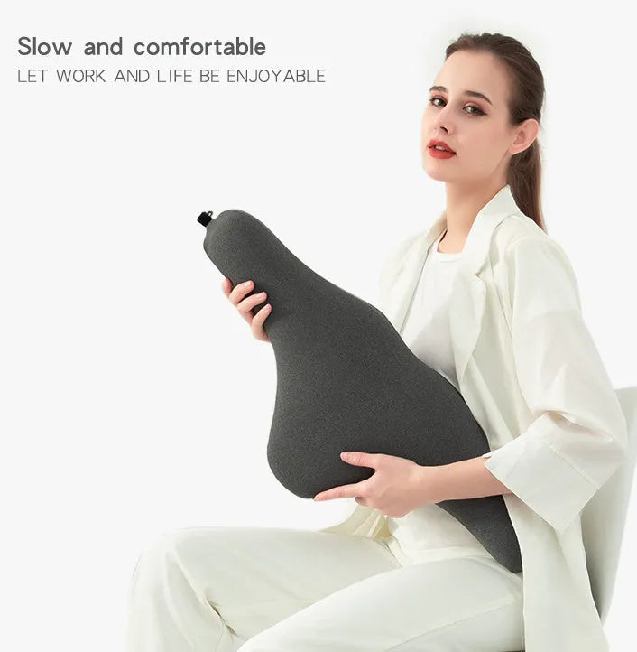 Dark grey memory foam car headrest pillow shown on car seat, measuring 67x10x27.5 cm.