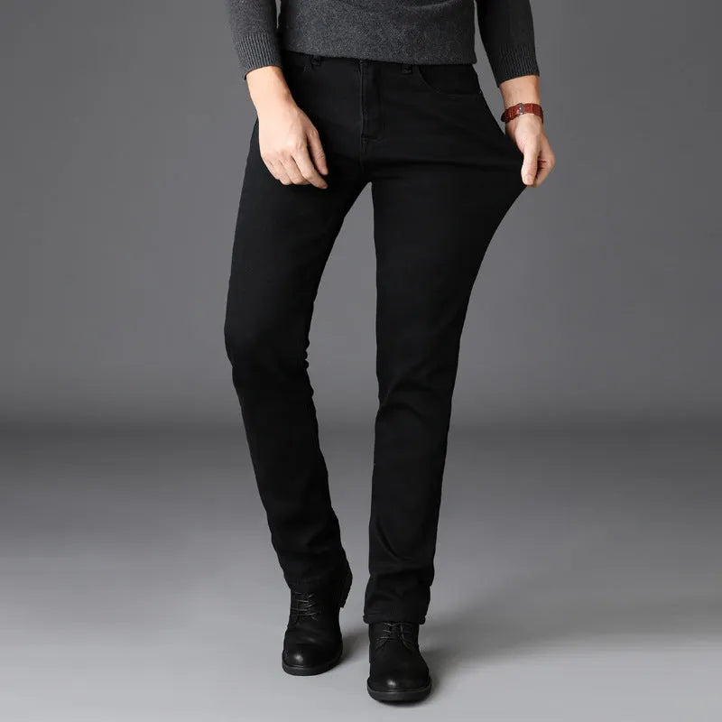 Men's slim straight black jeans made of cotton denim, flat lay