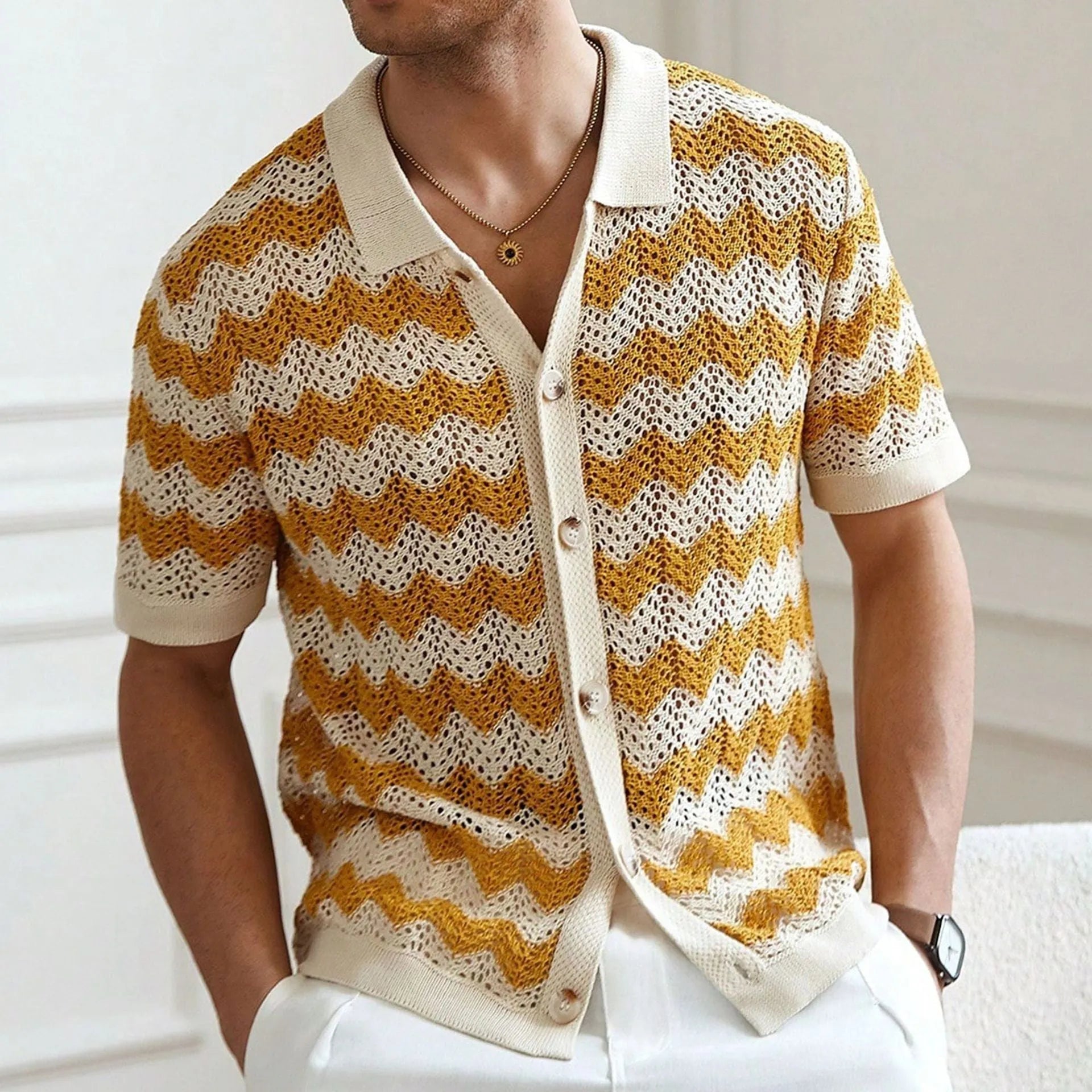 Yellow, blue, and brown short-sleeved sweater with a hollow jacquard corrugated texture.