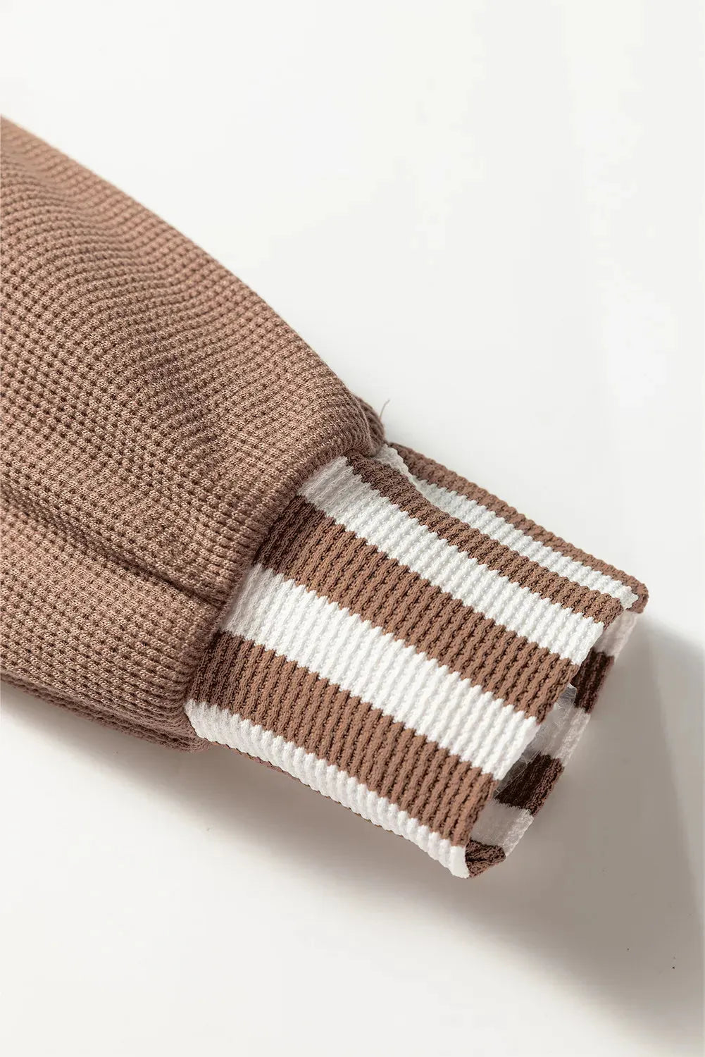 Straw yellow striped patchwork hoodie with a waffle texture and button neck drawstring.