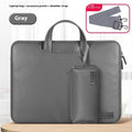 Black PU leather laptop bag with integrated power bank storage compartment