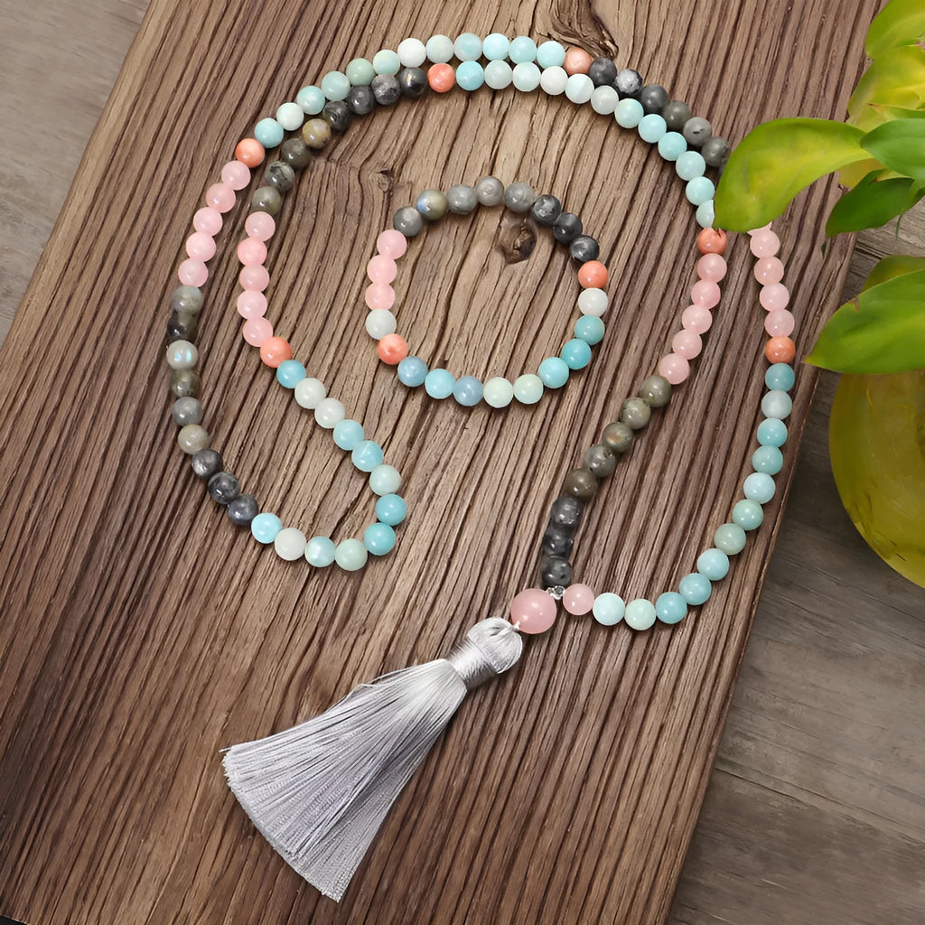 Bohemian jewellery set with colourful stone beads and tassel pendants showing necklace and bracelet pieces