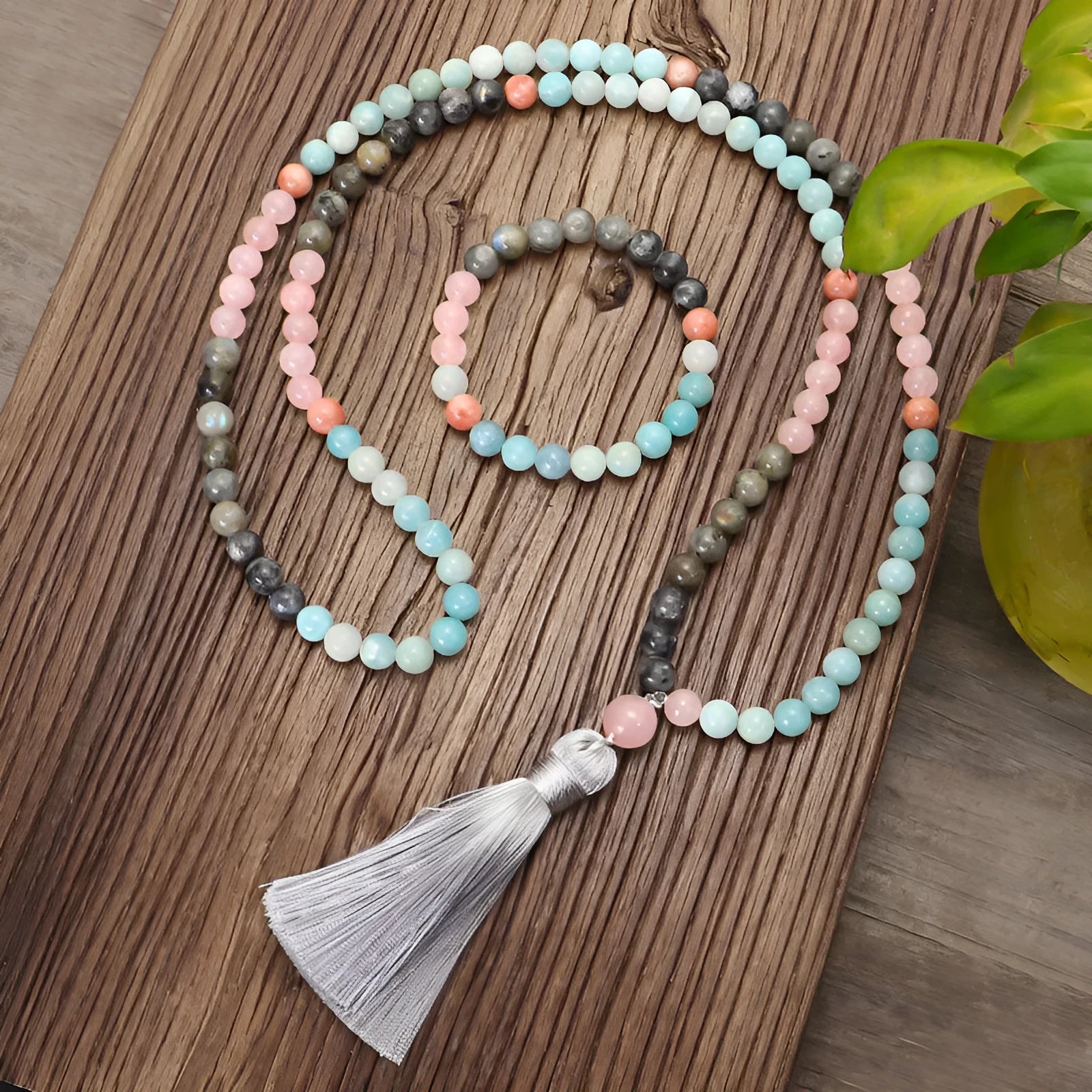 Bohemian jewellery set with colourful stone beads and tassel pendants showing necklace and bracelet pieces