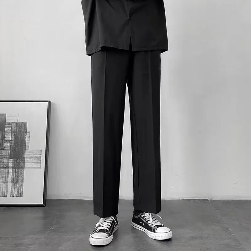 Loose Korean style casual wide leg trousers in polyester, shown in black, dark gray, light gray, or khaki, sizes S to 5XL.