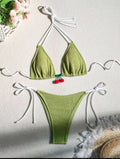 Solid colour nylon bikini briefs swimsuit in briefs style on a mannequin.