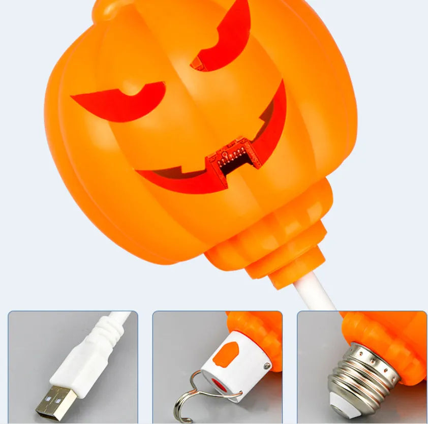 Plastic pumpkin lamp with USB power cable showing yellow or purple light options