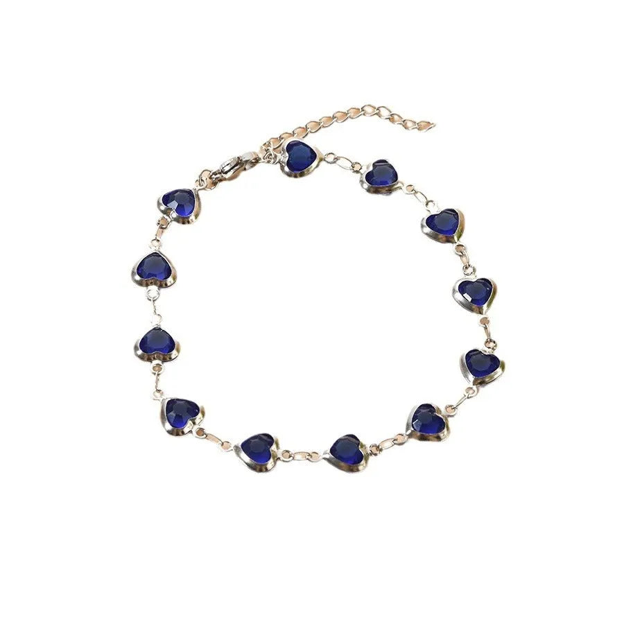 Stainless steel geometric Devil's Eye bracelet shown in one of six colour options: colourful, blue, green, red, light green, or light blue.