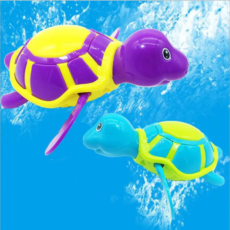 Small green plastic turtle bath toy for baby water play measuring 12cm