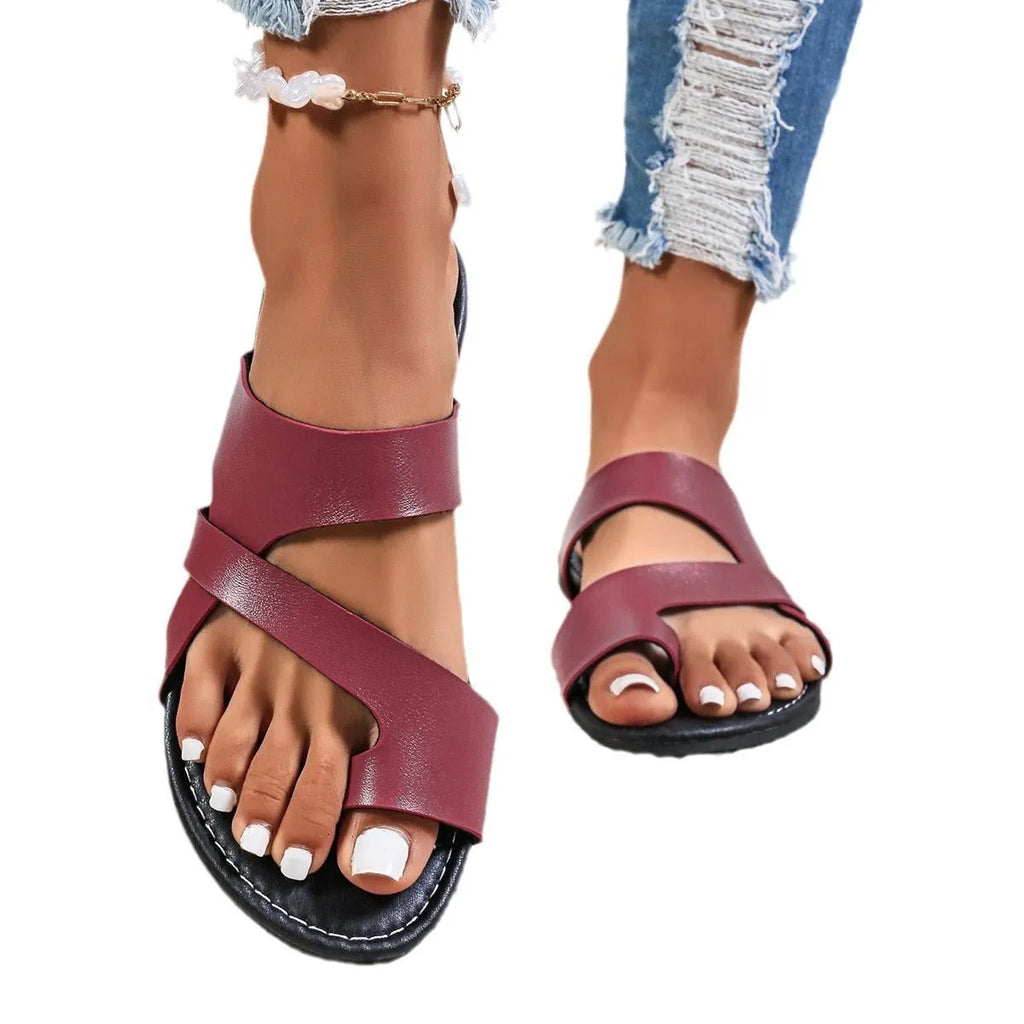 One-line casual beach slippers with hollow out design in artificial PU, showing black, brown and wine red colour options