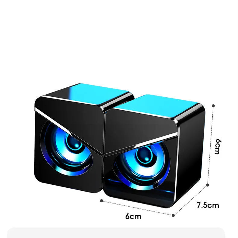 Black and white desktop USB cable speakers with volume control for computer audio