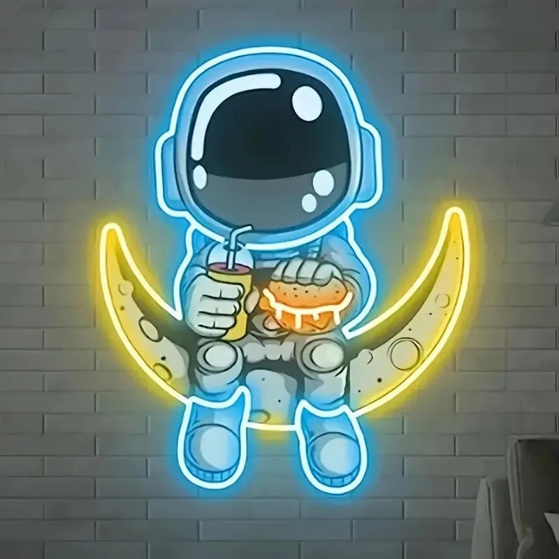 Blue Astronaut shaped LED neon light mounted on a wall, powered by USB.
