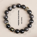 Natural silver stone Buddha beads bracelet 10mm hand toy on surface, unisex design
