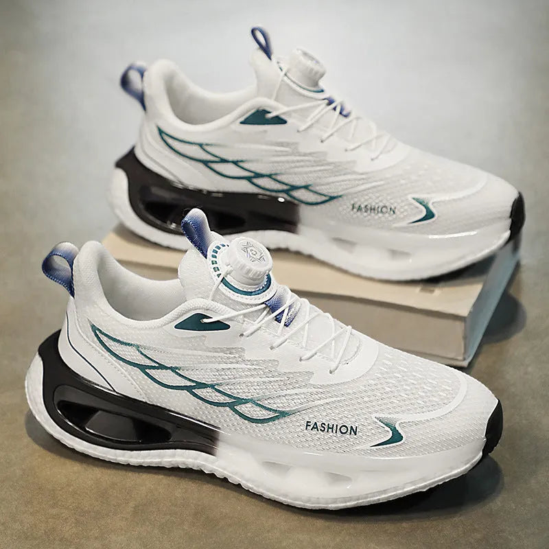 Low top youth sneaker with rotating button fastener in light blue, black, or white and blue colourways.