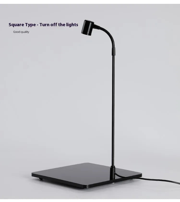 Round base LED USB plant lamp with white light on a glass container
