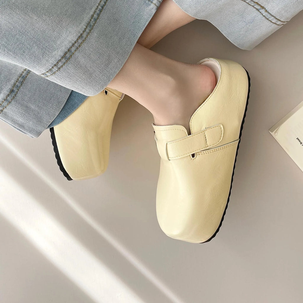Flat buckle casual sneakers with round toe in yellow, creamy-white, silver, and black colours
