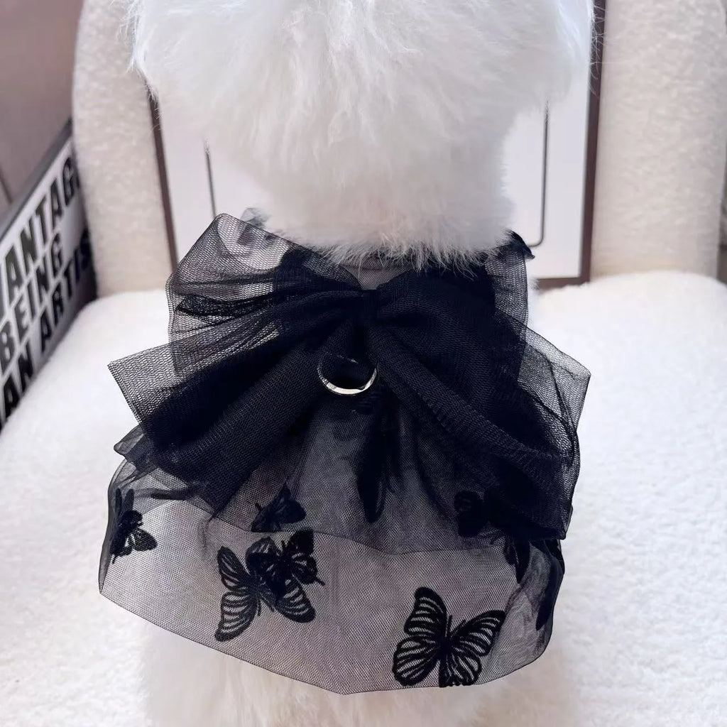 Black tulle princess skirt costume for a small dog on a mannequin.