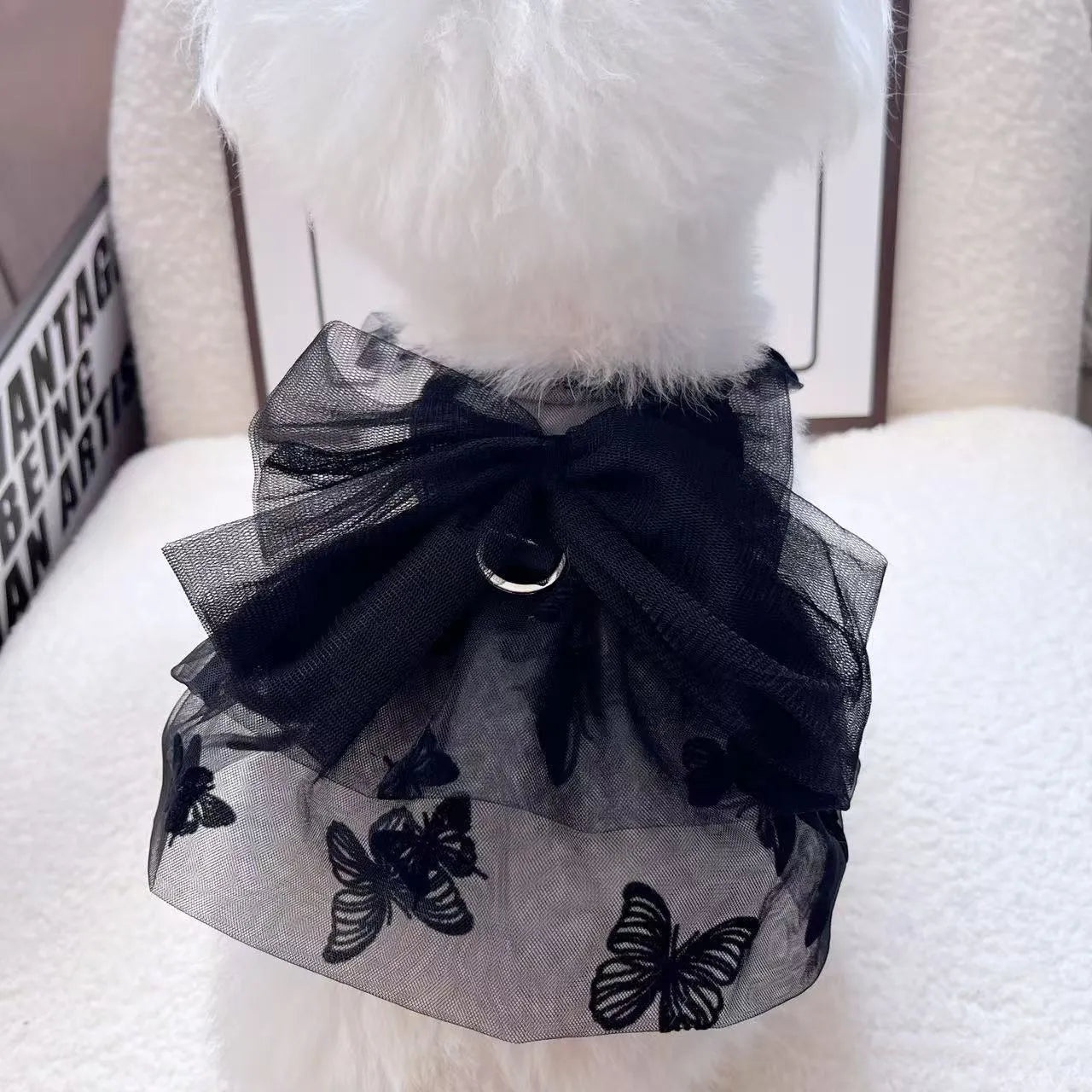 Black tulle princess skirt costume for a small dog on a mannequin.