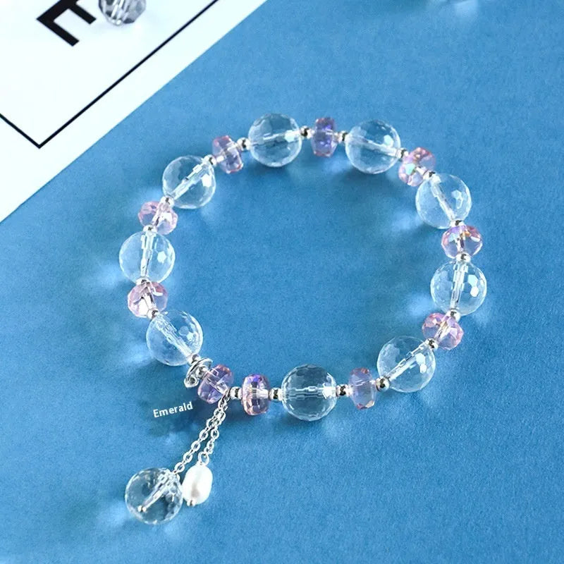 White crystal women's bracelet with diamond-shaped charms and lucky cat element on silver-tone chain