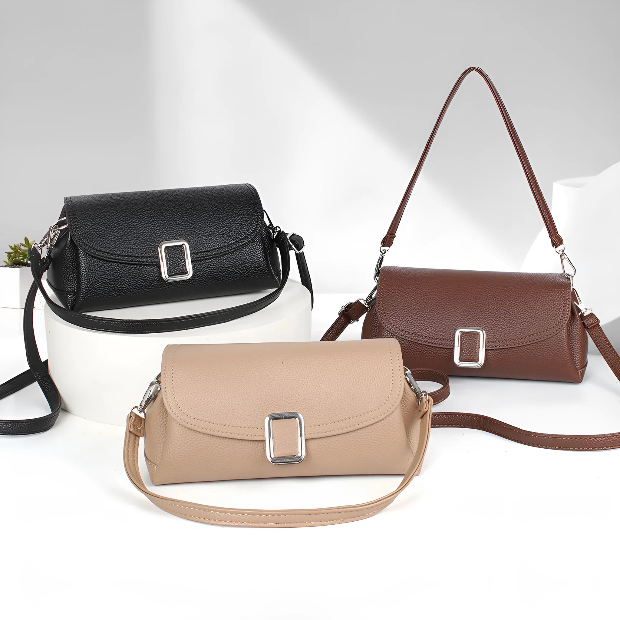 Women's PU shoulder handbag in beige, showing front view with adjustable strap.