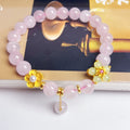 Pink crystal bracelet with peach blossom charm, handmade women's jewellery