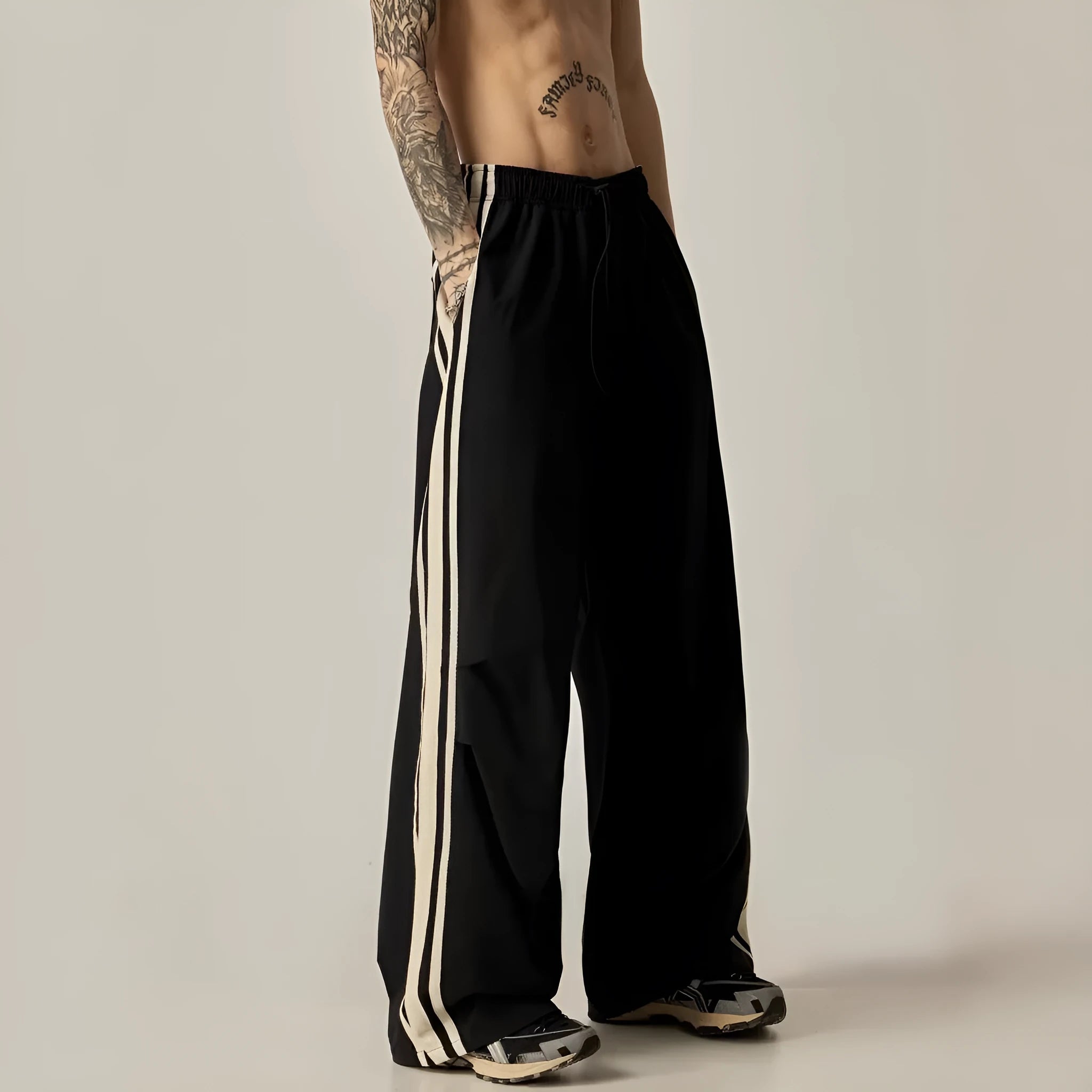 Black wide leg climbing trousers for men with high waist and straight leg design