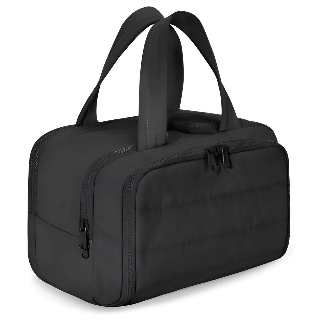 Large open travel toiletry bag in soft-touch polyester fabric, shown in a light blue colour.