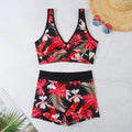 Women's two-piece swimsuit with printed boxer-style bikini bottoms in multi-colour patterns