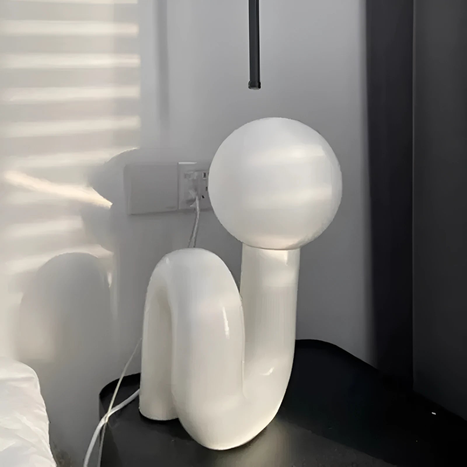 Pink and white resin bedside lamp with graphic customisation option for children's bedrooms